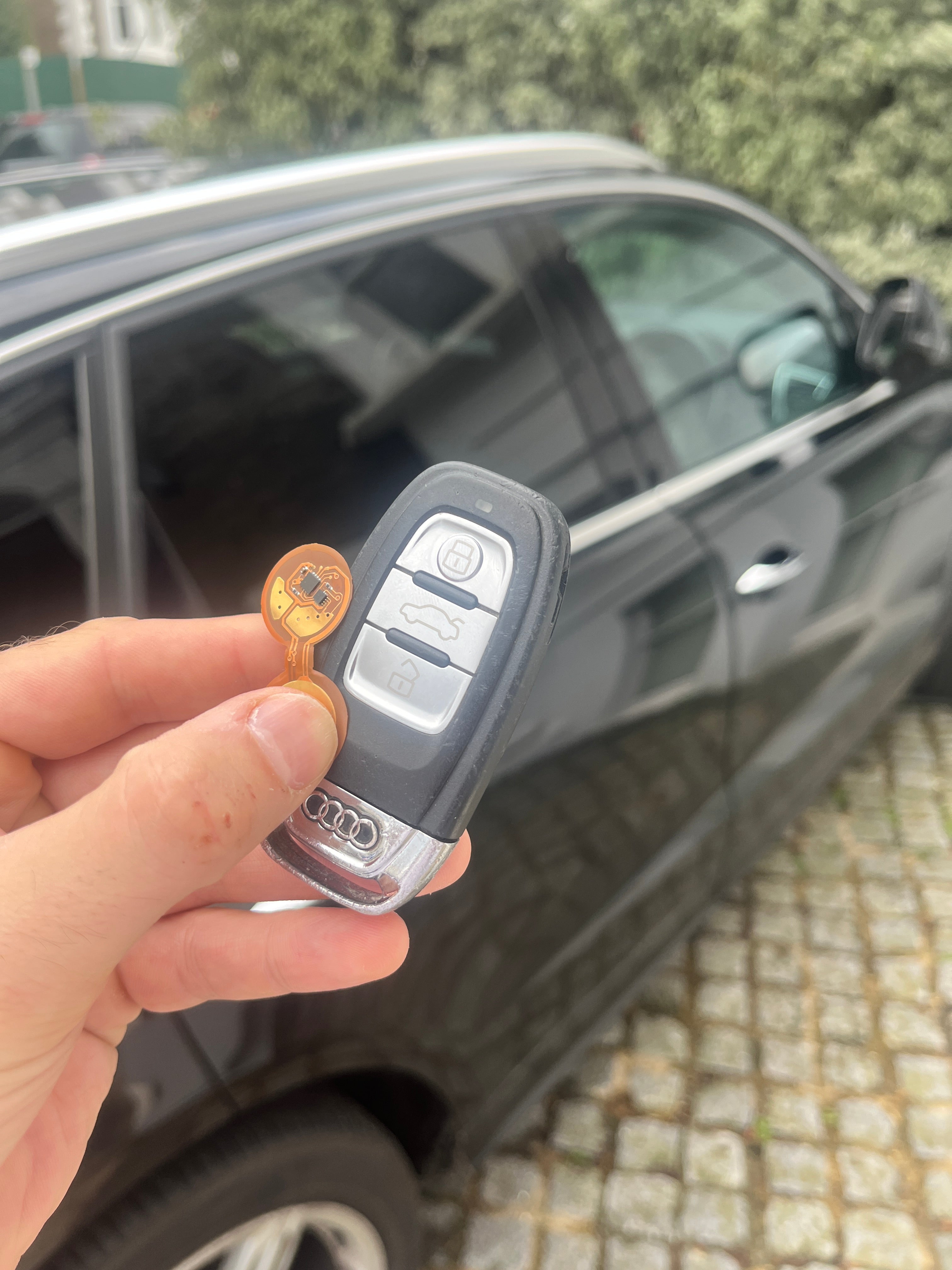 Audi car key with KEYSHIELD anti-theft security sleeve installed to prevent stolen car
