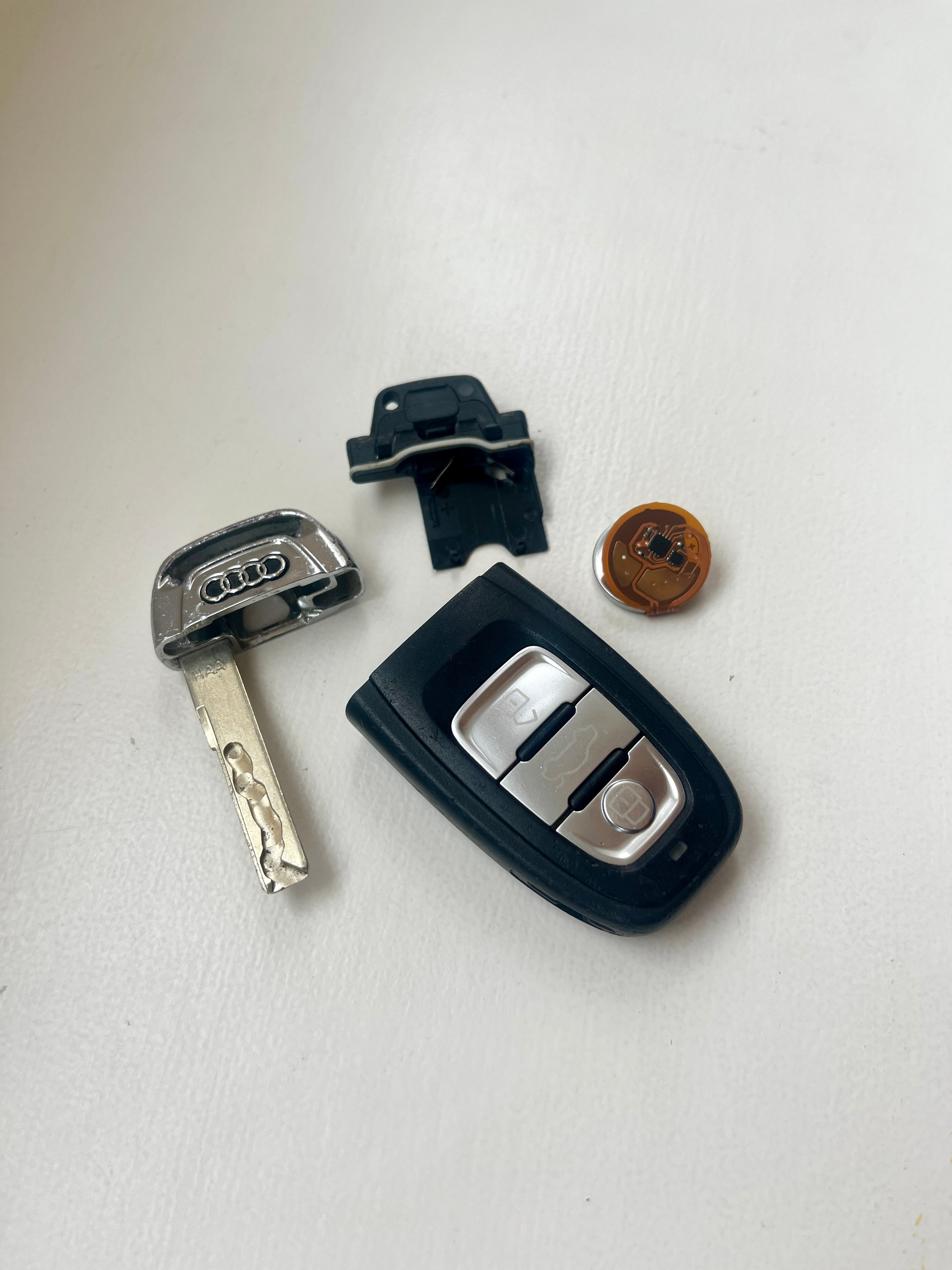Audi car key with KEYSHIELD anti-theft security sleeve installed to prevent stolen car