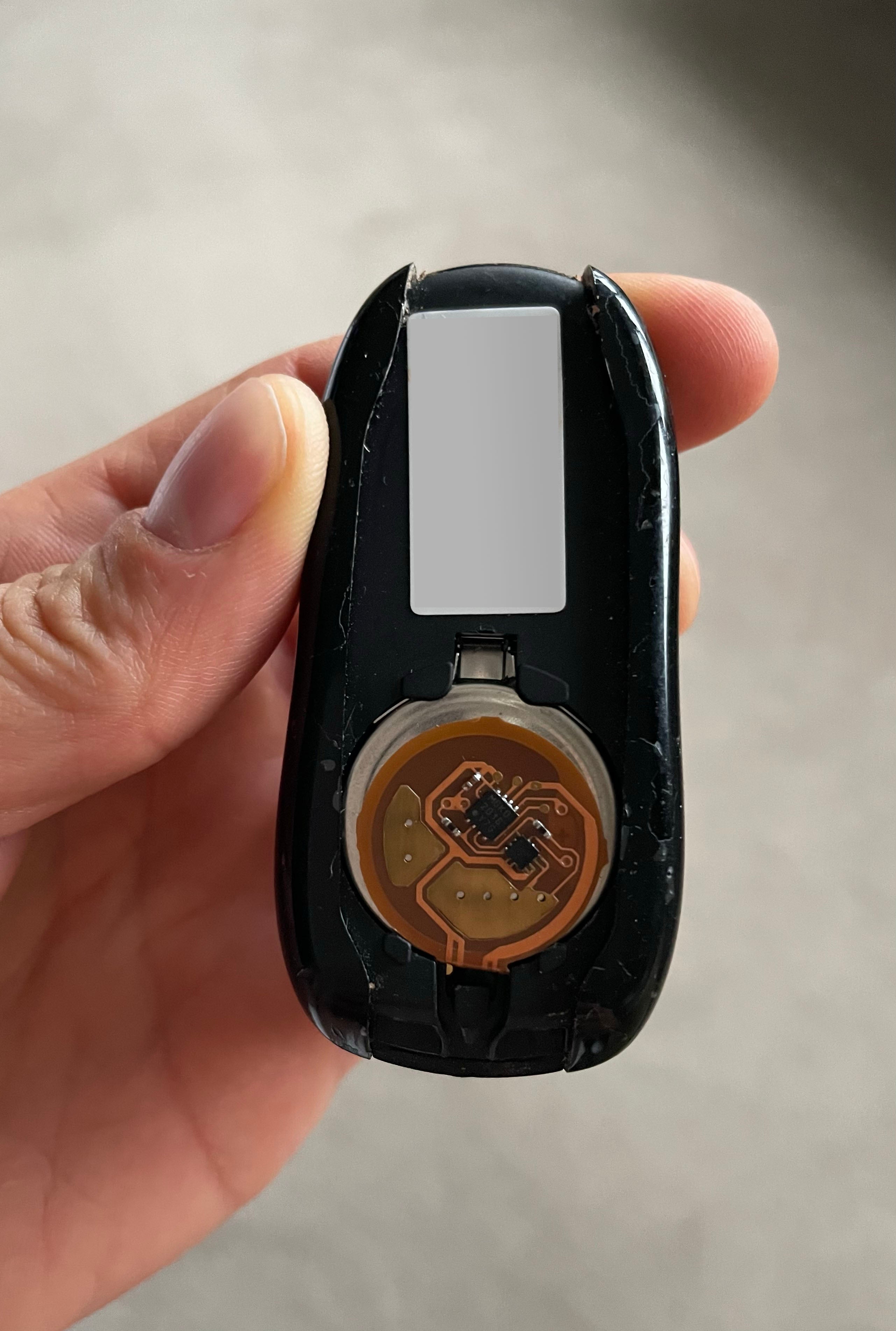 Tesla car key with KEYSHIELD anti-theft security sleeve installed to prevent car theft