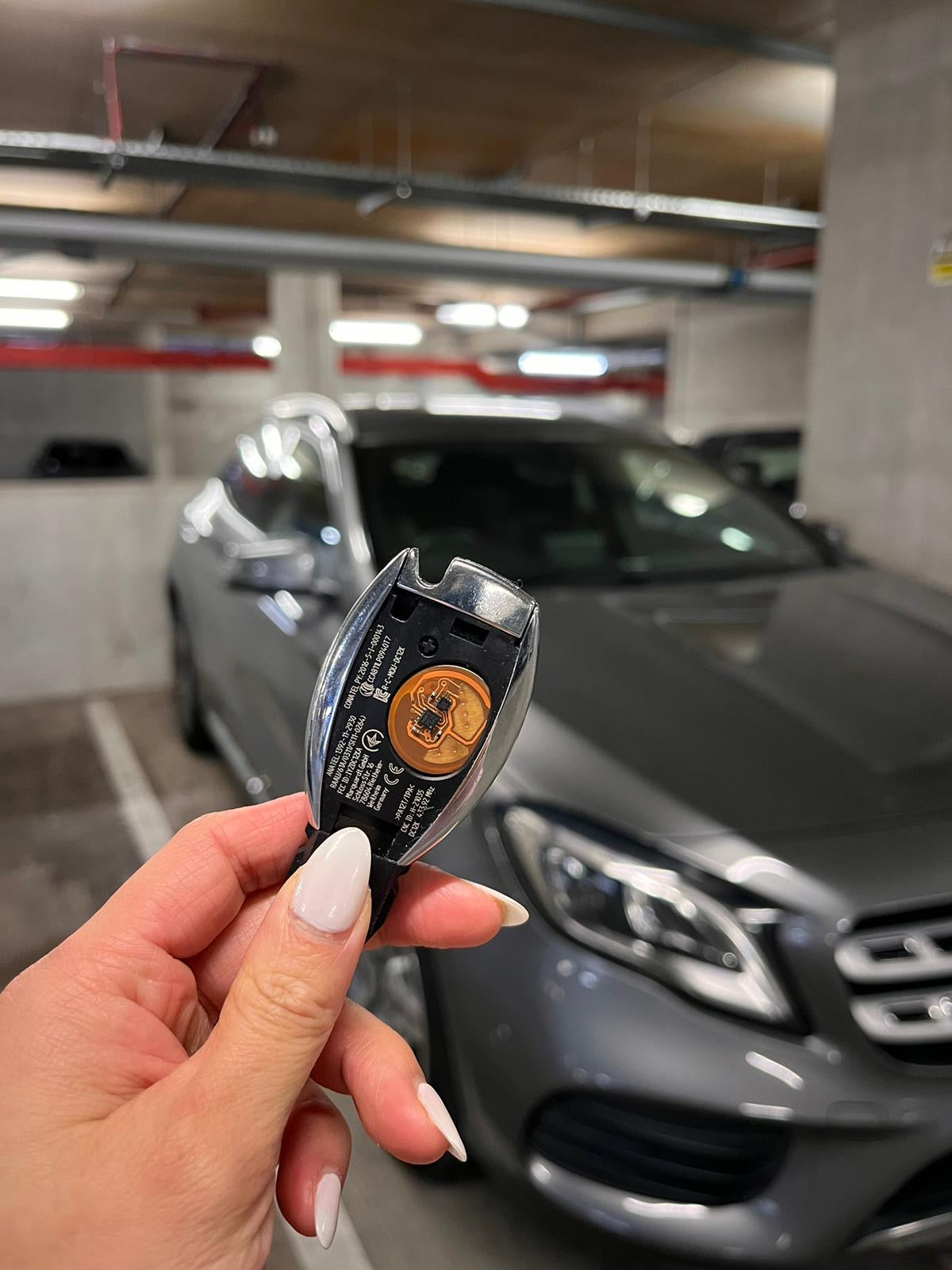 Mercedes car key with KEYSHIELD anti-theft security sleeve installed to prevent stolen car