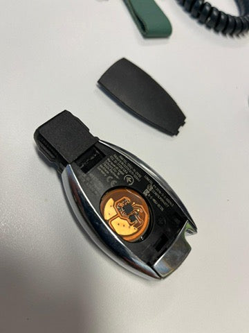 Mercedes car key with KEYSHIELD anti-theft security sleeve installed to prevent stolen car